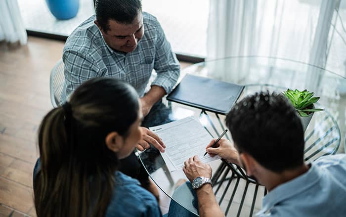 couple signing a contract