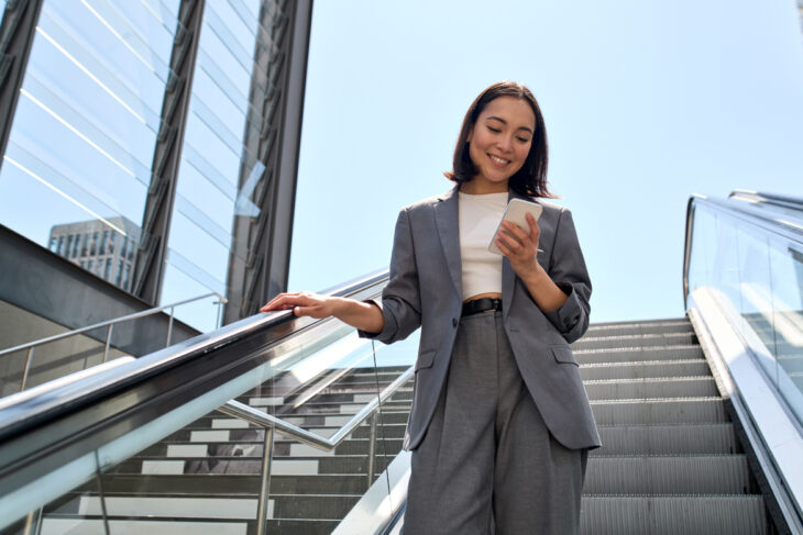 Woman on escalator
