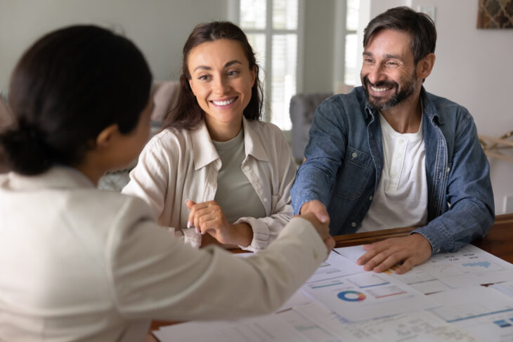 Man and woman meeting with a financial planner