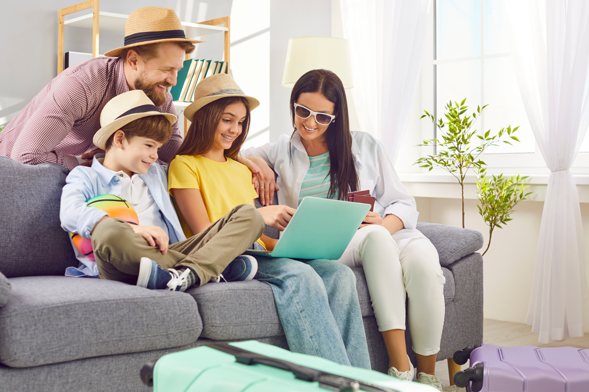 Family looking at laptop together