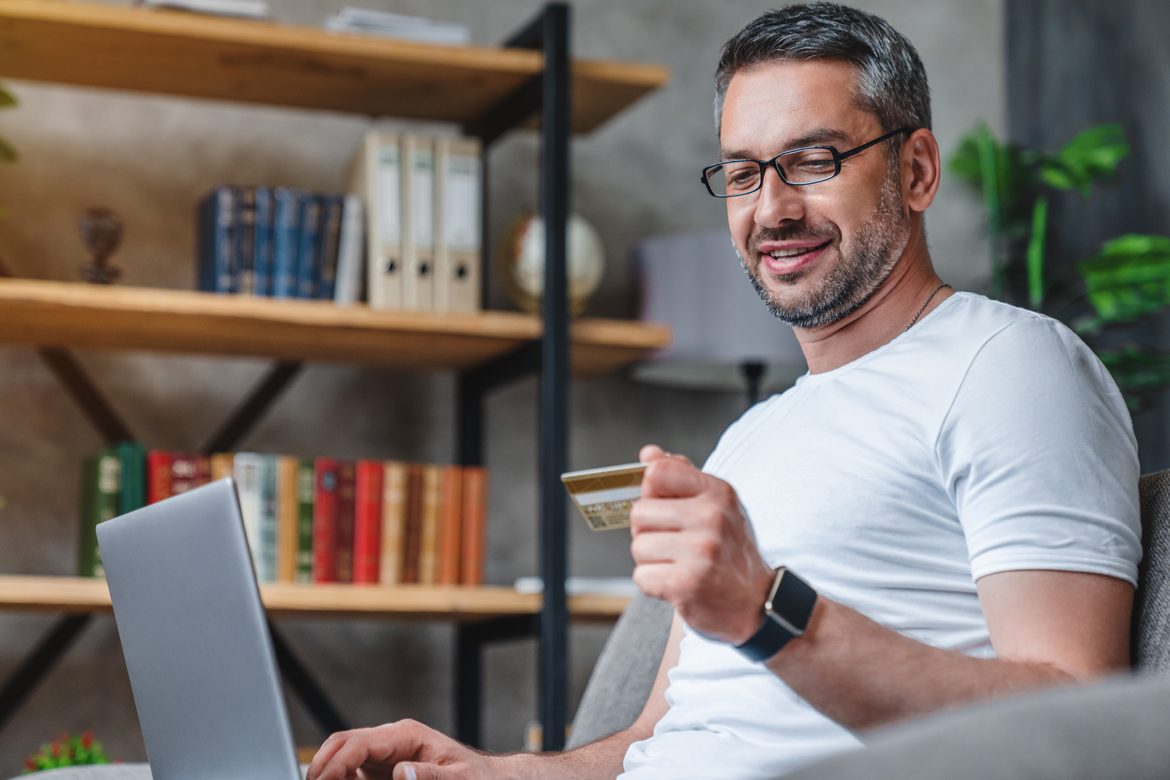 Man reading his card information