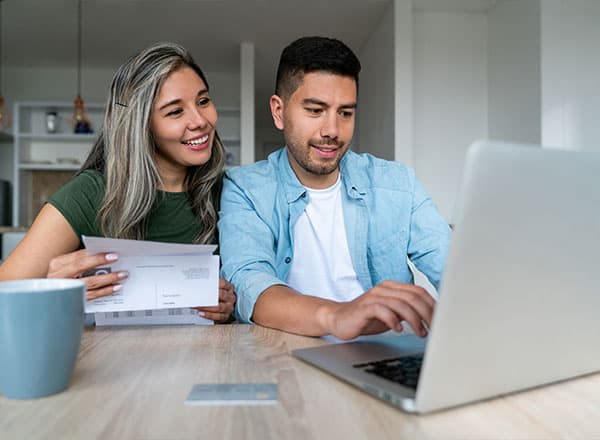 couple paying bills online