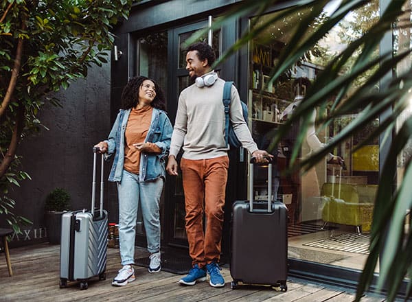 Couple with suitcases