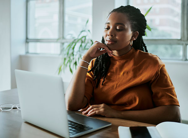 Woman looking at her computer