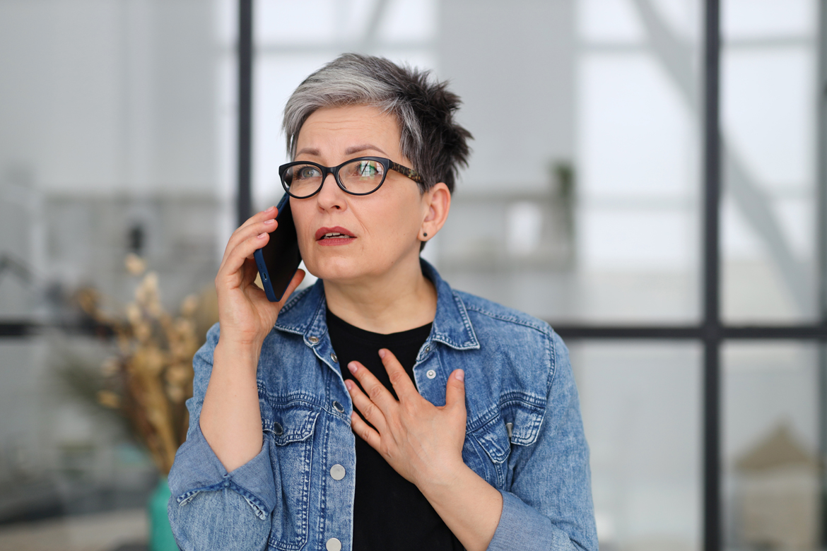 Concerned woman on the phone