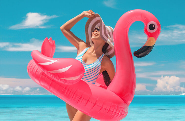 woman at the beach with a floatie