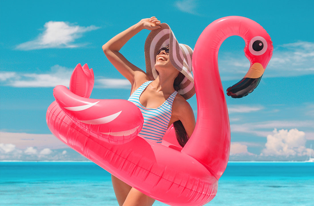 woman at the beach with a floatie