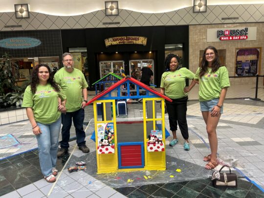 Patriot team with finished playhouse